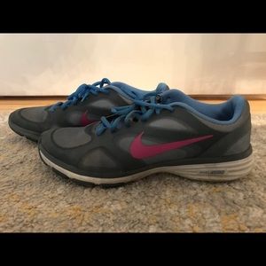 Nike running shoes. Blue,grey, pink.